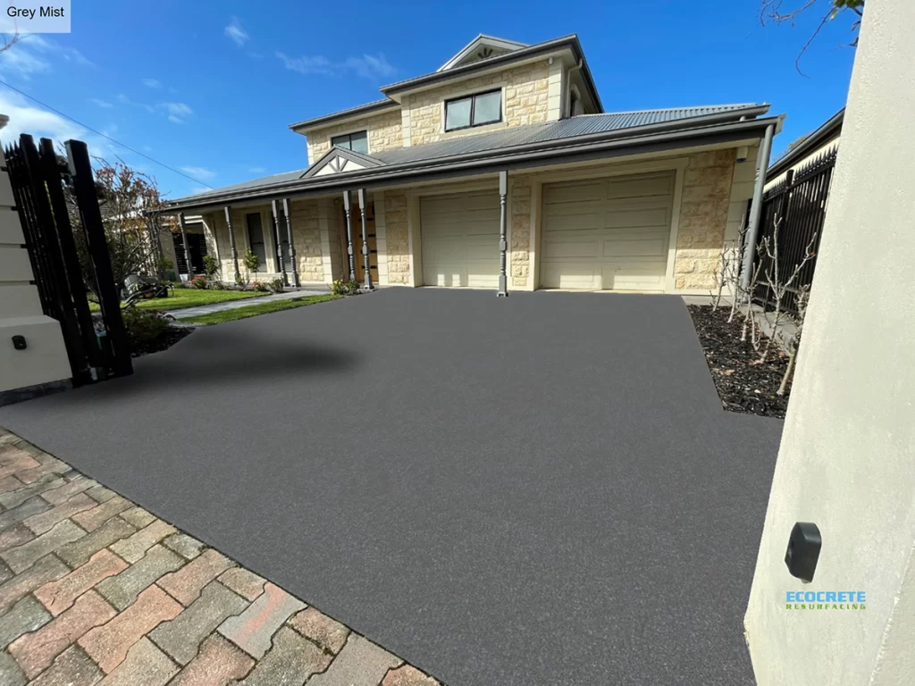 Newly resurfaced concrete driveway in grey mist finish, providing a sleek and modern look - EcoCrete Adelaide